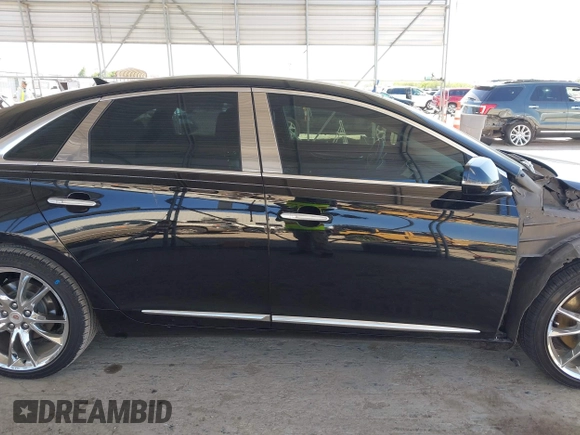 2013 Cadillac XTS Premium z VIN 2G61S5S36D9128244, wystawiony jako IAAI lot #41976485 z przebiegiem 88 033 mil mil oraz . Historia ofert i sprzedaży dostępna na DreamBid. Obrazek 13.