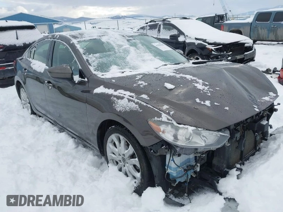 2016 Mazda Mazda6 i Touring with VIN JM1GJ1V58G1458699, listed as a IAAI auction lot 41598598 with 73,576 mi miles. Bid and sale history available at carsss.com. Image 1.