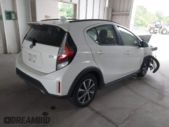 2018 Toyota Prius One with VIN JTDKDTB31J1608112, listed as a IAAI auction lot 42086063 with 51,847 mi miles and . Bid and sale history available at DreamBid. Image 4.
