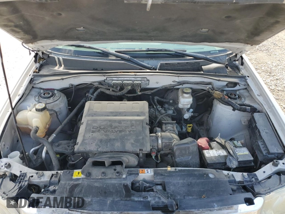 2012 Ford Escape XLT z VIN 1FMCU9DG2CKB54288, wystawiony jako Copart lot #61569655 z przebiegiem 169 899 mil mil oraz Szkoda całkowita • Salvage title. Historia ofert i sprzedaży dostępna na DreamBid. Obrazek 12.
