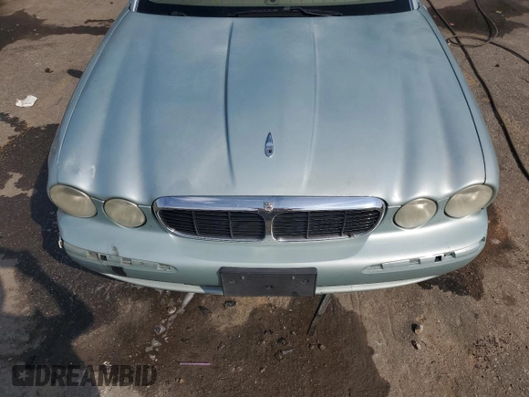 2004 Jaguar XJ with VIN SAJWA71C94SG24466, listed as a Copart auction lot 46610995 with 173,570 mi miles and Salvage Title. Bid and sale history available at carsss.com. Image 11.