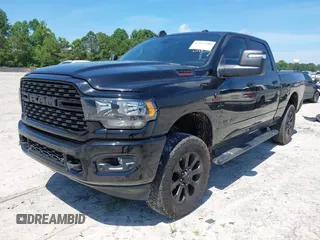 2023 Ram 2500 Big Horn with VIN 3C6UR5DL6PG504090, listed as a IAAI auction lot 42512380 with 50,231 mi miles and . Bid and sale history available at DreamBid. Image 2.