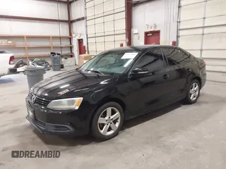 2014 Volkswagen Jetta SE with VIN 3VWD17AJ7EM409189, listed as a IAAI auction lot 42313804 with 139,950 mi miles and . Bid and sale history available at DreamBid. Image 2.