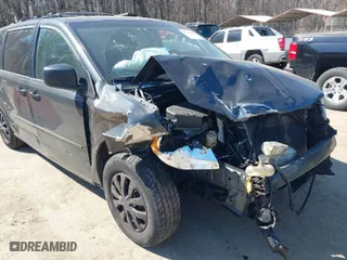2012 Dodge Grand Caravan SE with VIN 2C4RDGBG1CR214021, listed as a IAAI auction lot 41765065 with 210,794 mi miles. Bid and sale history available at carsss.com. Image 6.