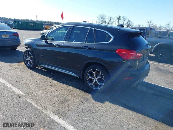 2018 BMW X1 xDrive28i with VIN WBXHT3C36J5F91110, listed as a IAAI auction lot 41757293 with 80,327 mi miles. Bid and sale history available at carsss.com. Image 3.