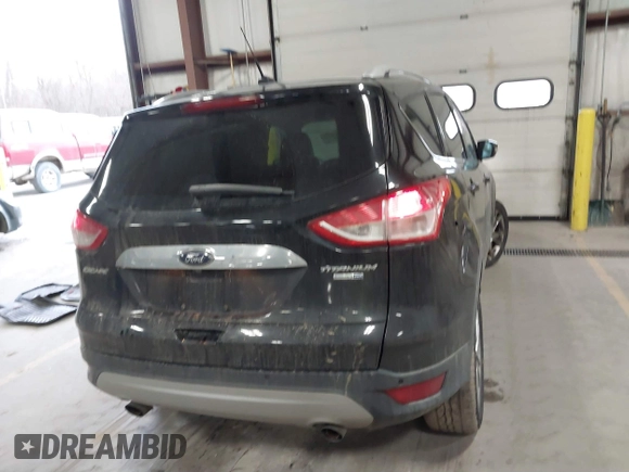 2015 Ford Escape Titanium z VIN 1FMCU0JX9FUB48089, wystawiony jako IAAI lot #41048127 z przebiegiem 133 439 mil mil oraz . Historia ofert i sprzedaży dostępna na DreamBid. Obrazek 16.