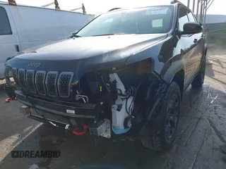 2022 Jeep Cherokee Trailhawk with VIN 1C4PJMBX1ND533715, listed as a IAAI auction lot 42041057 with 65,487 mi miles and . Bid and sale history available at DreamBid. Image 6.
