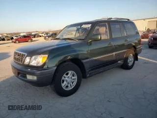 1999 Lexus LX 470 with VIN JT6HT00W6X0046402, listed as a Copart auction lot 85562544 with 289,786 mi miles and Salvage Title. Bid and sale history available at DreamBid. Image 1.