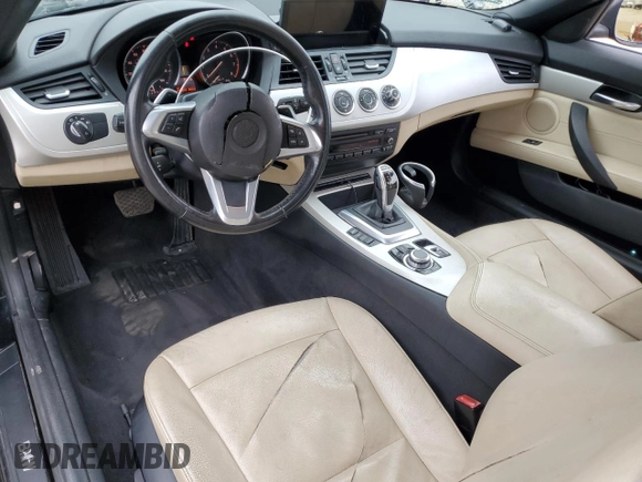 2012 BMW Z4 sDrive28i with VIN WBALL5C56CE716558, listed as a Copart auction lot 62003125 with 93,438 mi miles and Salvage title. Bid and sale history available at DreamBid. Image 8.