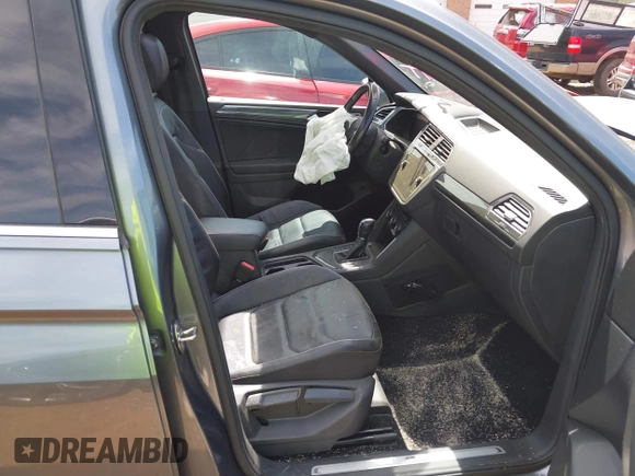 2018 Volkswagen Tiguan SEL Premium with VIN 3VV5B7AX4JM201579, listed as a IAAI auction lot 41932201 with 118,728 mi miles and . Bid and sale history available at DreamBid. Image 5.