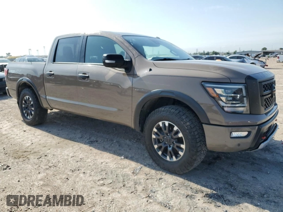 2021 Nissan Titan Pro-4X с VIN 1N6AA1ED2MN533749, выставлен на аукционе Copart как лот 54659655 с пробегом Не указан миль и Списание • Salvage title. История ставок и продаж доступна на DreamBid. Изображение 4.