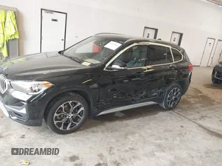 2022 BMW X1 xDrive28i with VIN WBXJG9C09N5U69567, listed as a IAAI auction lot 42273644 with 36,944 mi miles and . Bid and sale history available at DreamBid. Image 6.