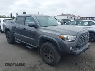 2020 Toyota Tacoma SR5 with VIN 3TMAZ5CN8LM131287, listed as a IAAI auction lot 42437998 with Not provided miles and . Bid and sale history available at DreamBid. Image 1.
