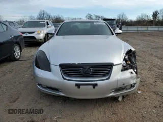 2006 Lexus SC 430 z VIN JTHFN48Y369000493, wystawiony jako Copart lot #46929945 z przebiegiem 141 704 mil mil oraz Szkody całkowita. Historia ofert i sprzedaży dostępna na DreamBid. Obrazek 5.