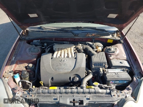 2002 Hyundai Sonata GLS with VIN KMHWF35H42A512538, listed as a IAAI auction lot 42000170 with 157,172 mi miles. Bid and sale history available at carsss.com. Image 10.
