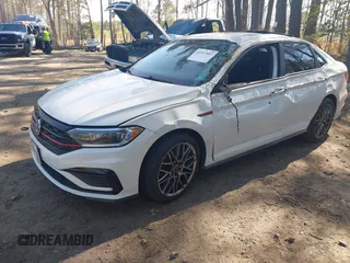 2020 Volkswagen Jetta GLI S with VIN 3VW6T7BUXLM038747, listed as a IAAI auction lot 41937087 with 71,831 mi miles and . Bid and sale history available at DreamBid. Image 2.