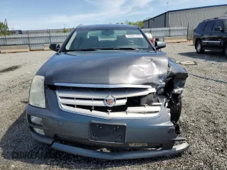2007 Cadillac STS z VIN 1G6DW677870121149, wystawiony jako Copart lot #53341775 z przebiegiem 110 590 mil mil oraz Szkody całkowita. Historia ofert i sprzedaży dostępna na DreamBid. Obrazek 5.