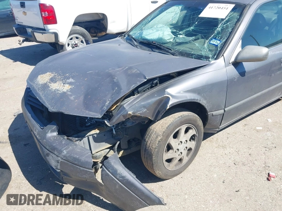 1998 Toyota Camry LE z VIN JT2BF22K6W0117441, wystawiony jako IAAI lot #41720451 z przebiegiem Nie podano mil oraz . Historia ofert i sprzedaży dostępna na DreamBid. Obrazek 6.