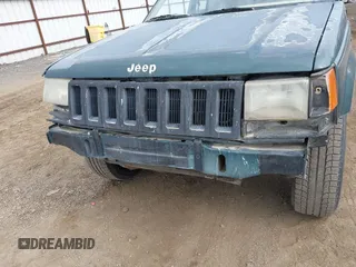 1994 Jeep Grand Cherokee Laredo with VIN 1J4GZ58S9RC215874, listed as a IAAI auction lot 42577378 with 230,824 mi miles and . Bid and sale history available at DreamBid. Image 6.