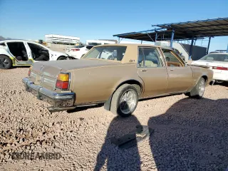 1985 Oldsmobile 88 z VIN 1G3BY69Y7F9098039, wystawiony jako Copart lot #87831785 z przebiegiem 72 684 mil mil oraz Szkody całkowita. Historia ofert i sprzedaży dostępna na DreamBid. Obrazek 3.