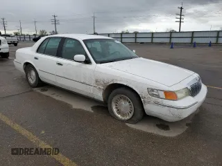 1999 Mercury Grand Marquis LS с VIN 2MEFM75W6XX619412, выставлен на аукционе Copart как лот 51939515 с пробегом 131 784 миль миль и Списание • Salvage title. История ставок и продаж доступна на DreamBid. Изображение 4.