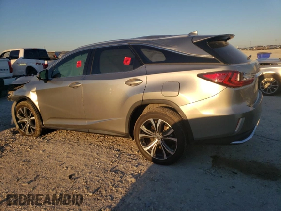 2021 Lexus RX 350L z VIN JTJHZKEA0M2019757, wystawiony jako Copart lot #71006144 z przebiegiem Nie podano mil oraz Szkoda całkowita • Salvage title. Historia ofert i sprzedaży dostępna na DreamBid. Obrazek 2.