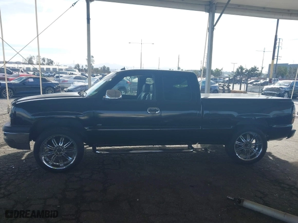 2003 Chevrolet Silverado 1500 LS with VIN 1GCEK19T53E131290, listed as a IAAI auction lot 41414921 with 191,890 mi miles. Bid and sale history available at carsss.com. Image 15.