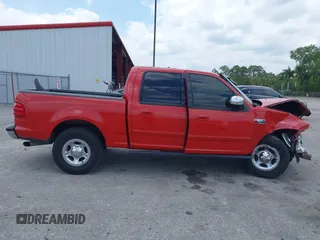2002 Ford F-150 XLT with VIN 1FTRW07L62KC34432, listed as a IAAI auction lot 41816271 with 263,813 mi miles and . Bid and sale history available at DreamBid. Image 14.