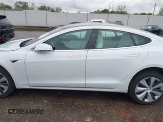 2021 Tesla Model S Long Range Plus with VIN 5YJSA1E21MF425482, listed as a IAAI auction lot 41886030 with Not provided miles and . Bid and sale history available at DreamBid. Image 13.