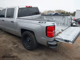 2014 Chevrolet Silverado 1500 LT with VIN 3GCUKREC6EG432954, listed as a IAAI auction lot 41491764 with 148,293 mi miles. Bid and sale history available at carsss.com. Image 3.