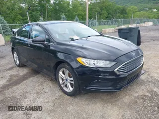 2018 Ford Fusion SE z VIN 3FA6P0HD3JR238610, wystawiony jako IAAI lot #42330221 z przebiegiem 70 995 mil mil oraz . Historia ofert i sprzedaży dostępna na DreamBid. Obrazek 1.