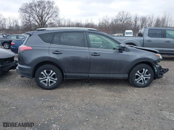 2016 Toyota RAV4 LE with VIN JTMBFREVXGJ091427, listed as a IAAI auction lot 42010142 with 165,548 mi miles. Bid and sale history available at carsss.com. Image 13.