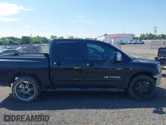 2005 Nissan Titan LE with VIN 1N6AA07B05N509859, listed as a IAAI auction lot 42662424 with 252,000 mi miles and . Bid and sale history available at DreamBid. Image 14.