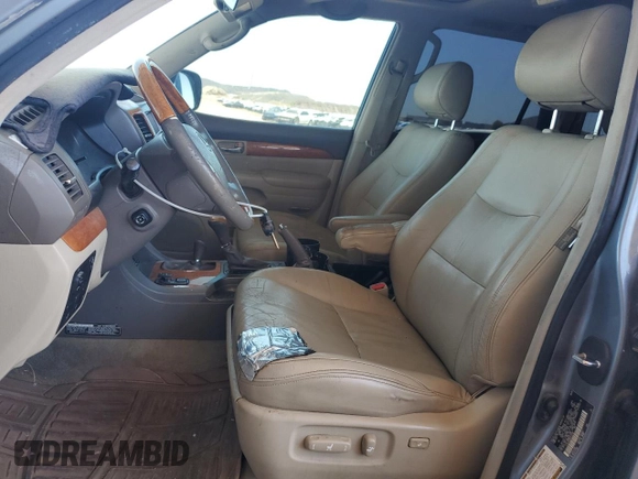 2006 Lexus GX 470 z VIN JTJBT20X960120748, wystawiony jako Copart lot #60102405 z przebiegiem 242 521 mil mil oraz Czysty tytuł • Clean title. Historia ofert i sprzedaży dostępna na DreamBid. Obrazek 7.