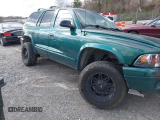 2003 Dodge Durango SLT with VIN 1D4HS48N93F574458, listed as a IAAI auction lot 41887140 with 281,567 mi miles and . Bid and sale history available at DreamBid. Image 1.