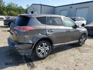 2018 Toyota RAV4 LE z VIN 2T3ZFREVXJW438231, wystawiony jako Copart lot #54773235 z przebiegiem 80 623 mil mil oraz Szkoda całkowita • Salvage title. Historia ofert i sprzedaży dostępna na DreamBid. Obrazek 3.