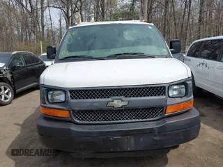 2014 Chevrolet Express Cargo Van with VIN 1GCWGFCA7E1110011, listed as a IAAI auction lot 41983301 with 114,827 mi miles. Bid and sale history available at carsss.com. Image 12.