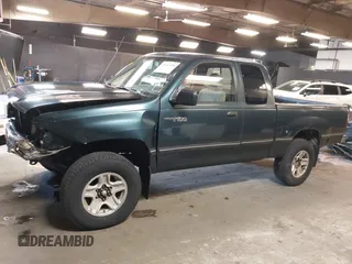 1996 Toyota T100 DX with VIN JT4UN22D2T0020138, listed as a IAAI auction lot 41912550 with 164,007 mi miles. Bid and sale history available at carsss.com. Image 14.