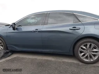 2019 Toyota Avalon XLE with VIN 4T1BZ1FB3KU033885, listed as a IAAI auction lot 41774796 with 77,835 mi miles. Bid and sale history available at carsss.com. Image 14.