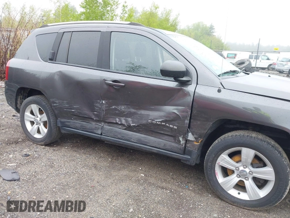 2016 Jeep Compass Sport with VIN 1C4NJDBB1GD632341, listed as a IAAI auction lot 42043710 with 80,137 mi miles and . Bid and sale history available at DreamBid. Image 6.