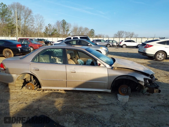 2002 Honda Accord EX z VIN 1HGCG16522A065397, wystawiony jako IAAI lot #41790485 z przebiegiem 223 389 mil mil oraz . Historia ofert i sprzedaży dostępna na DreamBid. Obrazek 13.