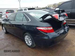 2015 Toyota Camry XLE with VIN 4T4BF1FK9FR450447, listed as a IAAI auction lot 41771512 with 218,691 mi miles and . Bid and sale history available at DreamBid. Image 3.