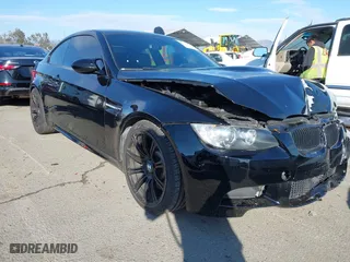 2011 BMW M3 with VIN WBSKG9C54BE796976, listed as a IAAI auction lot 41905088 with 143,849 mi miles. Bid and sale history available at carsss.com. Image 1.