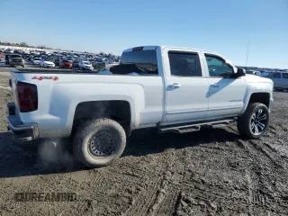 2016 Chevrolet Silverado 1500 LT with VIN 3GCUKREC9GG259501, listed as a Copart auction lot 87671785 with 159,336 mi miles and Salvage Title. Bid and sale history available at DreamBid. Image 3.