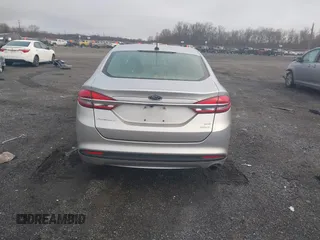 2018 Ford Fusion SE z VIN 3FA6P0HD2JR207865, wystawiony jako IAAI lot #41835895 z przebiegiem 91 069 mil mil oraz . Historia ofert i sprzedaży dostępna na DreamBid. Obrazek 16.