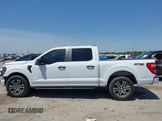 2023 Ford F-150 XL with VIN 1FTEW1CP5PKF42521, listed as a IAAI auction lot 42257062 with 30,758 mi miles and . Bid and sale history available at DreamBid. Image 14.