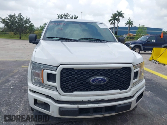 2019 Ford F-150 XL with VIN 1FTEW1CP3KKD55769, listed as a IAAI auction lot 42622540 with 114,317 mi miles and . Bid and sale history available at DreamBid. Image 13.