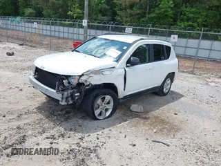 2016 Jeep Compass Sport with VIN 1C4NJCBA0GD742797, listed as a IAAI auction lot 42177186 with 128,665 mi miles and . Bid and sale history available at DreamBid. Image 2.