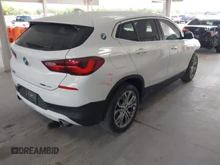 2022 BMW X2 sDrive28i z VIN WBXYH9C08N5U29086, wystawiony jako IAAI lot #42119627 z przebiegiem 76 364 mil mil oraz . Historia ofert i sprzedaży dostępna na DreamBid. Obrazek 4.