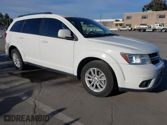 2015 Dodge Journey SXT with VIN 3C4PDCBG8FT673824, listed as a IAAI auction lot 41603661 with 169,939 mi miles and . Bid and sale history available at DreamBid. Image 1.